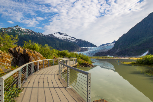 A morning view of the Mendenhall Glacier, in Juneau, Alaska. The elevated pathway leads to a beautiful view point.