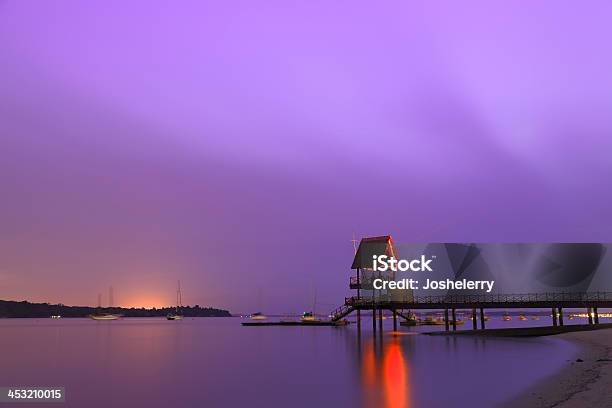 Spiaggia Di Changi - Fotografie stock e altre immagini di Acqua - Acqua, Alba - Crepuscolo, Albero