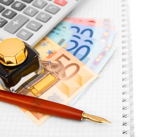 istock Money, the calculator, pen on a notebook. 453210615