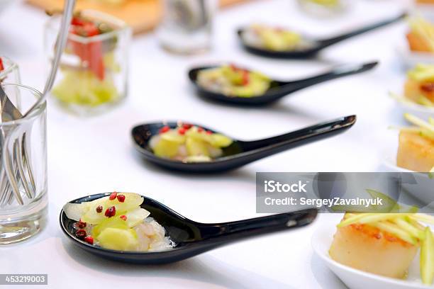 Scallops In The Spoon Stock Photo - Download Image Now - Canape, Ceramics, Crustacean