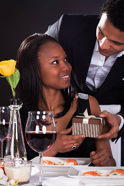 istock African Couple With A Gift In Hands 453221669