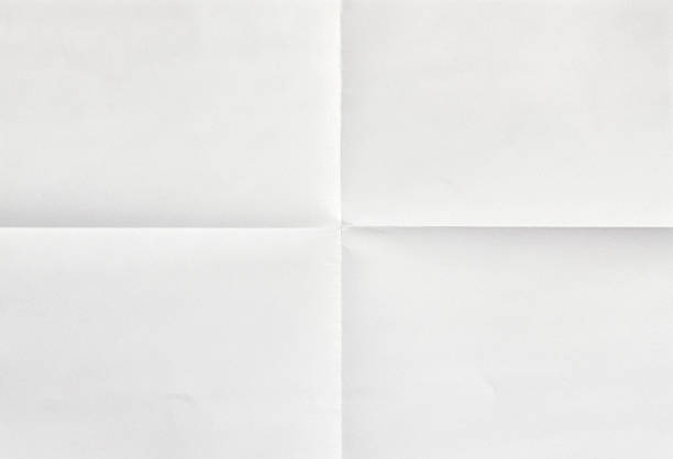 bianco foglio di carta in quattro - crease foto e immagini stock