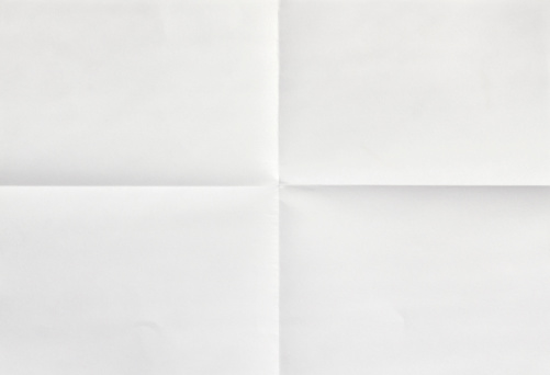 White sheet of paper folded in four