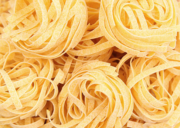 istock pasta fettuccine background 453223107
