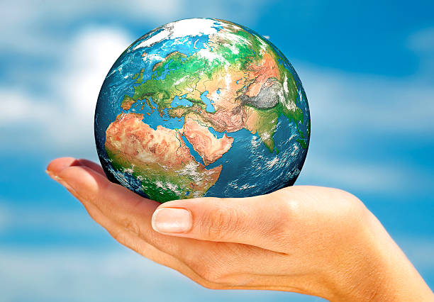 istock Hand of the person holds globe. 453227623