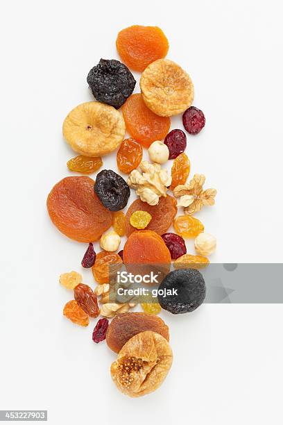 Mixed Dried Fruits And Nuts Stock Photo - Download Image Now - Dried Fruit, White Background, Dry