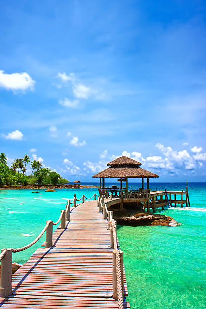 Sea with pier under blue cloudy sky in Koh Kood , Thailand