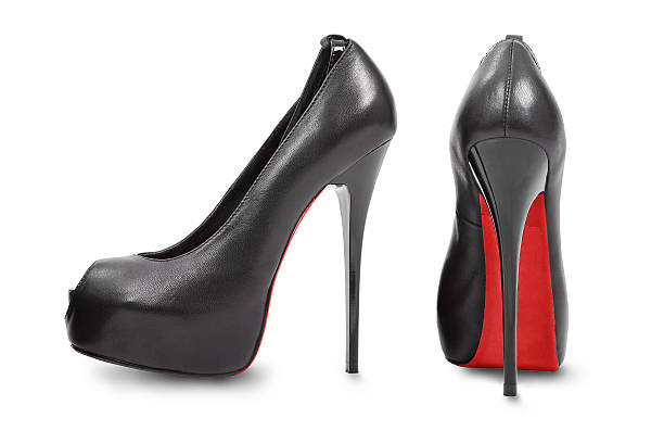 Black high hill shoes isolated on white