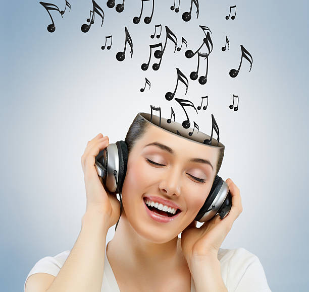 istock girl with headphones 453230591
