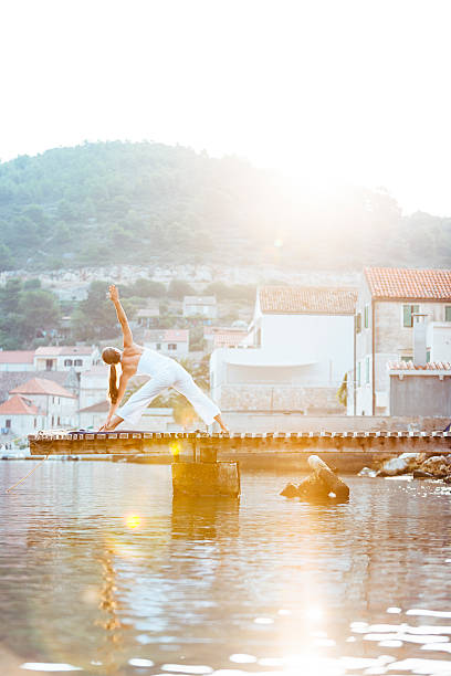 istock Female doing early morning yoga 453241589