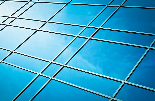 istock window glass reflection of cloudy sky 453241767