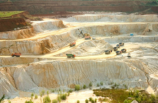 istock Kaolin career with white plaster material and trucks 453243013