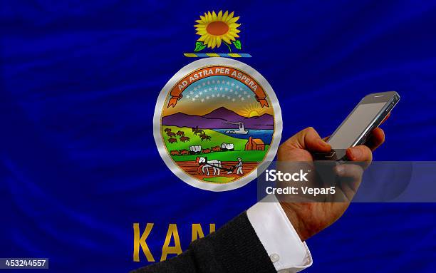 Cell Phone In Front Flag Of American State Kansas Stock Photo - Download Image Now - Close-up, Communication, Concepts