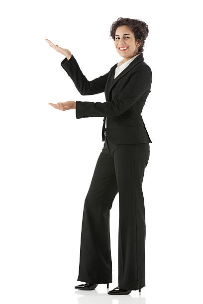 istock Smiling young businesswoman presenting 453249295