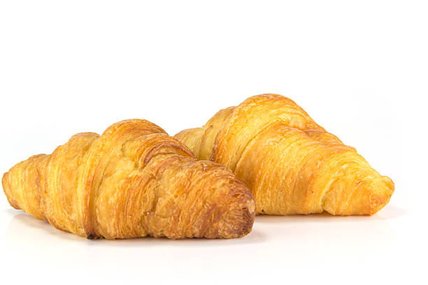 istock fresh and tasty croissant on white background 453249489