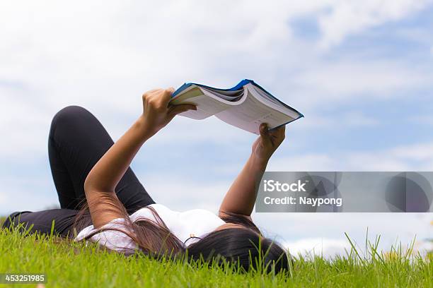 Asian Woman Using Tablet Computer Stock Photo - Download Image Now - Adult, Adults Only, Backgrounds