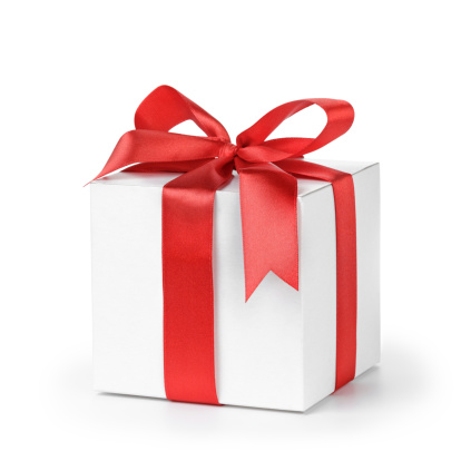 Gift box with red ribbon on white. This file is cleaned, retouched and contains clipping path.