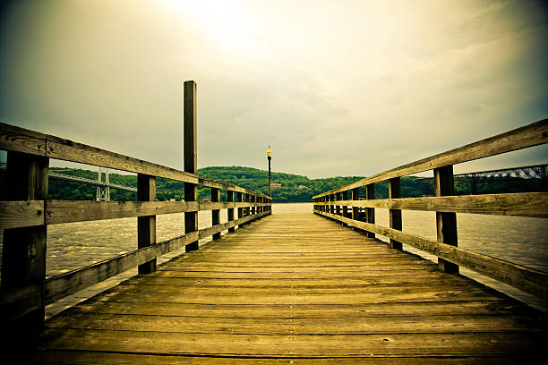 Pier with river view and sky for copy stock photo