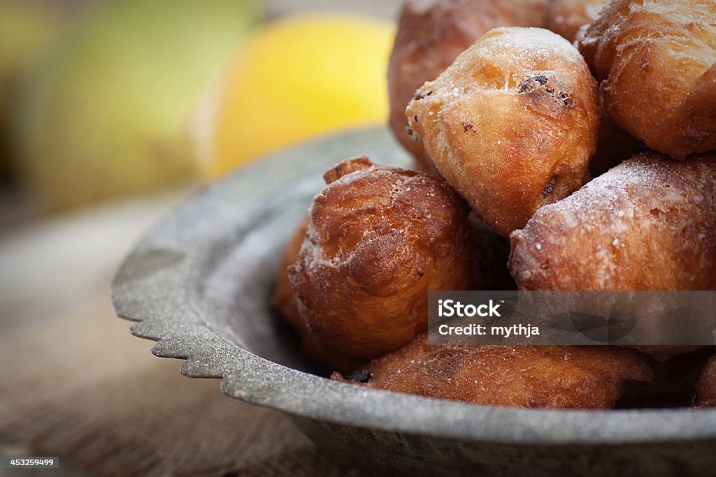 Deep fried fritters donuts Bowl of Deep fried fritters donuts in rustic country setting Baked Pastry Item Stock Photo