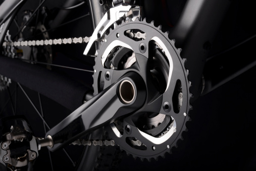 Bike chainset with chain on black background