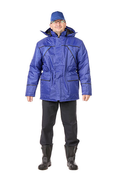 istock Man in winter workwear and hard hat. 453260359