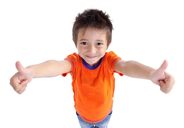 istock little boy gesturing thumbs up sign 453263659