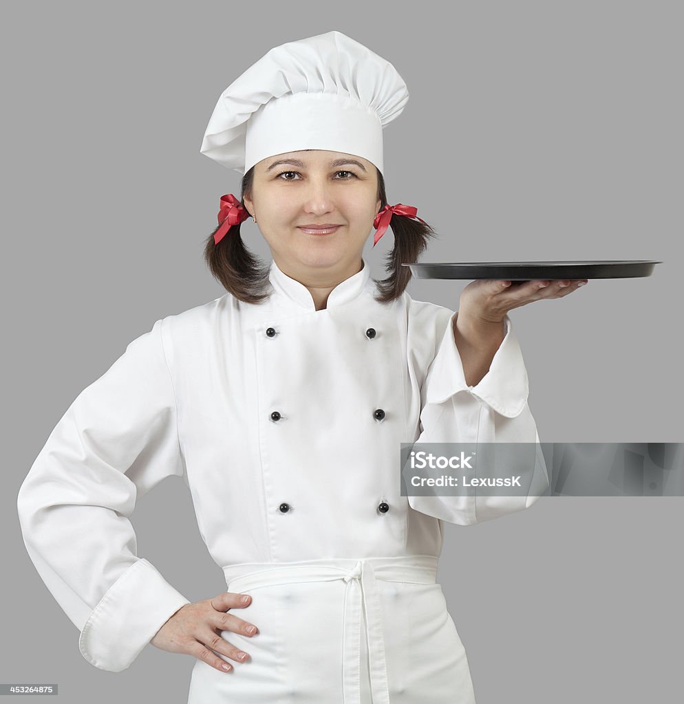 Femmina chef in un vassoio. - Foto stock royalty-free di Adulto
