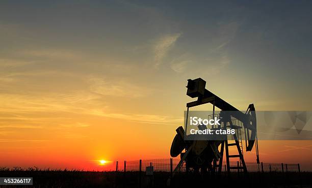 Operating Oil And Gas Well Stock Photo - Download Image Now - Change, Changing Form, Climate