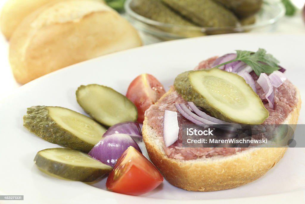 fresh chopped bread fresh white bread with pickles on a light background Baked Stock Photo