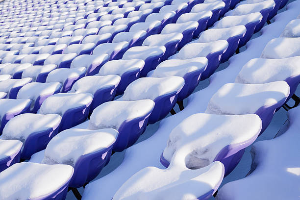 istock Seats are covered by snow 453275705