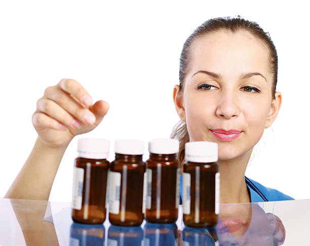 istock female doctor holding a bottle pills 453279005