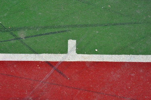 Basketball court lines on painted concrete minimal grungy background.