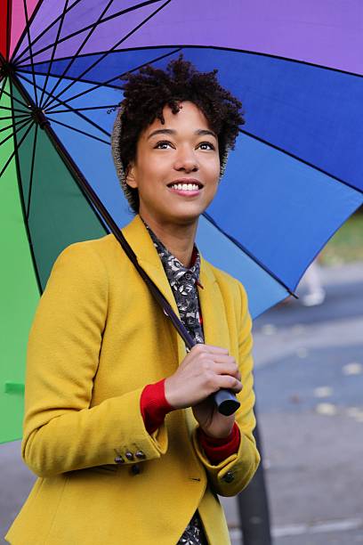 istock Beautifull girl with umbrella 453284289