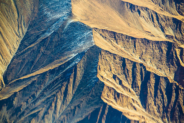 istock aerial view of mountains and clouds on top 453286229