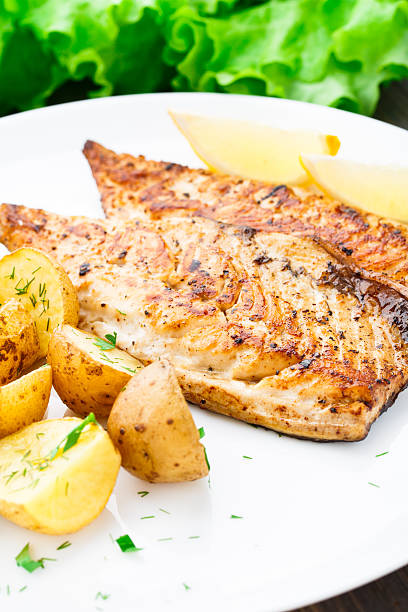 istock Fried mackerel with baked potato 453297583