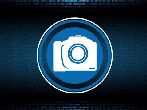 Photo camera icon with binary data code digital bacckground