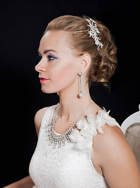 istock Wedding fashion and hair - Beautiful bride looking sideway 453306511