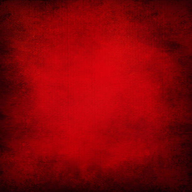 istock abstract red background or Christmas paper with bright center 453307035