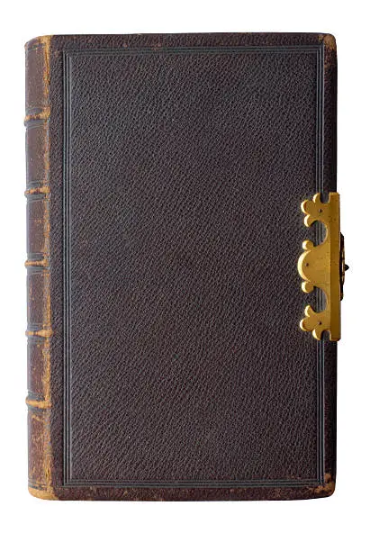 An old leather-bound bible with a brass clasp (With clipping path).