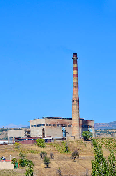 istock old rafinery plant chimney- Stock Image 453313689