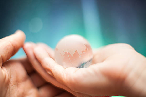 istock Glass world in your hands 453314327