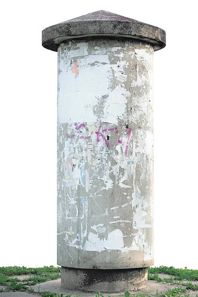 istock Grunge concrete advertising pillar, isolated weathered aged blank empty 453314547