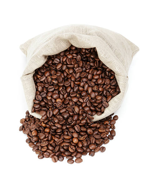 istock roasted coffee beans spill out of the bag 453379091