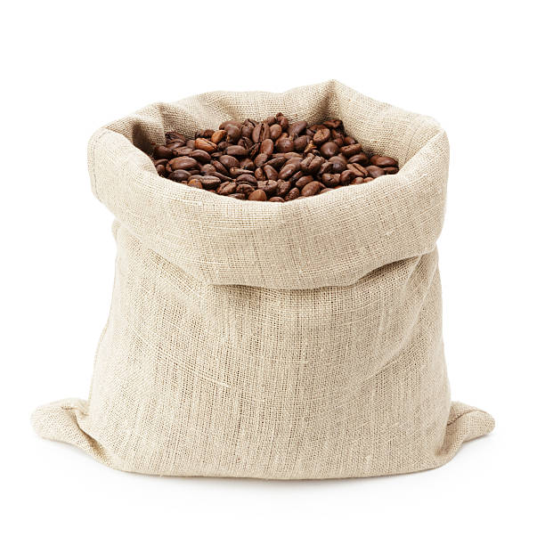 bolsa cheia de saco de grãos de café torrados - coffee bag burlap textured - fotografias e filmes do acervo