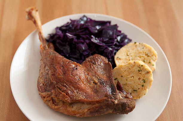 istock Roasted goose leg with braised red cabbage and dumplings 453379937