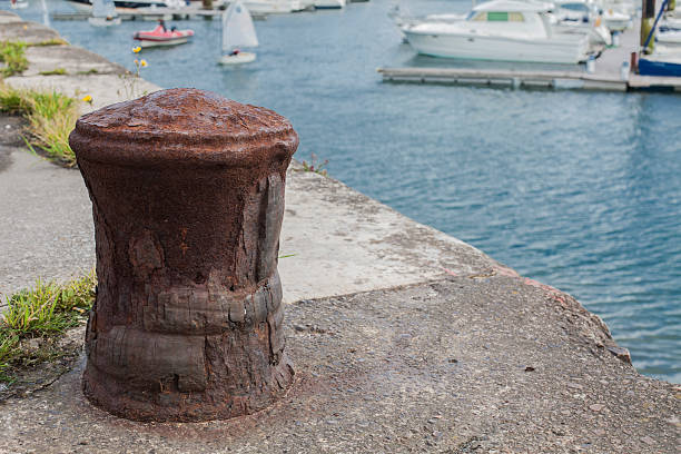 istock Rope and bollard in harbor 453382619
