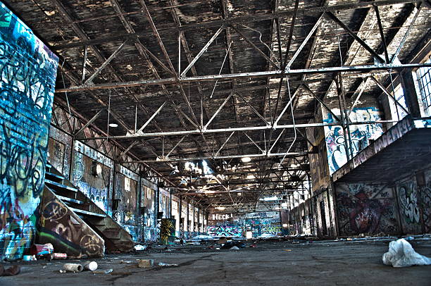 Dirty urban grunge old abandonned factory graffiti blue Montreal stock photo