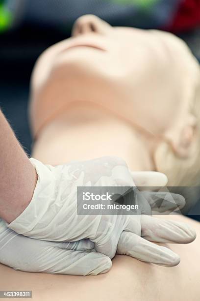 Cpr Chest Compressions Stock Photo - Download Image Now - CPR, First Aid Kit, Accidents and Disasters