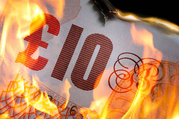 £10  burning stock photo