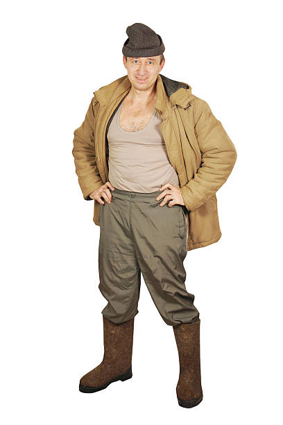 istock Untidy man wears winter clothes 453403731